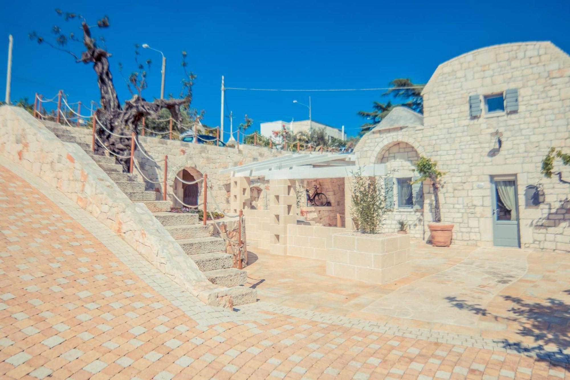Navolte Trulli E Quiete Con Piscina Villa โลโกโรตอนโด ภายนอก รูปภาพ